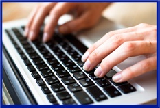 A picture showing someone typing on a keyboard with black keys