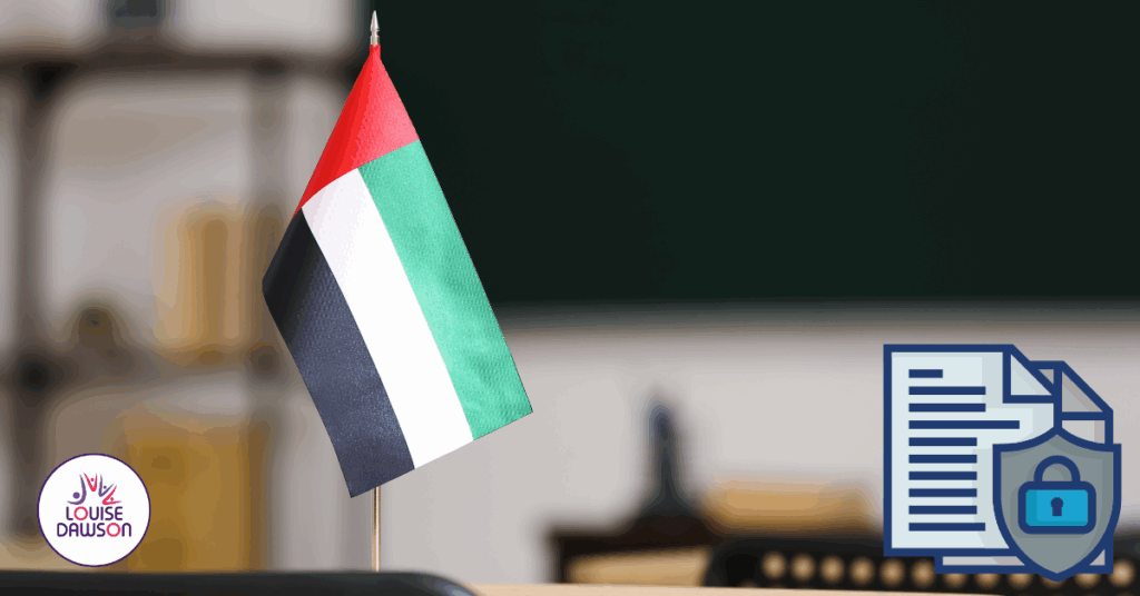 UAE flag on a desk in a classroom with a data privacy shield icon.