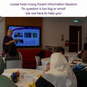 Image of Louise, 6ft blonde, wearing a purple top. Standing in front of a group of parents answering questions.