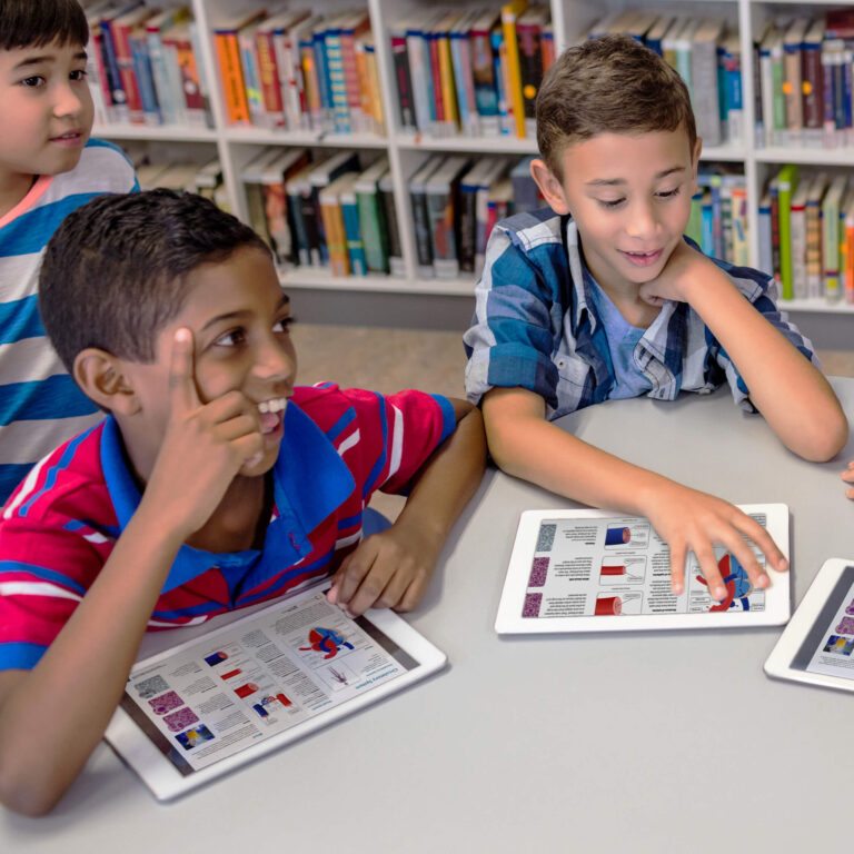 An image showing students working with Cornerstones International curriculum materials